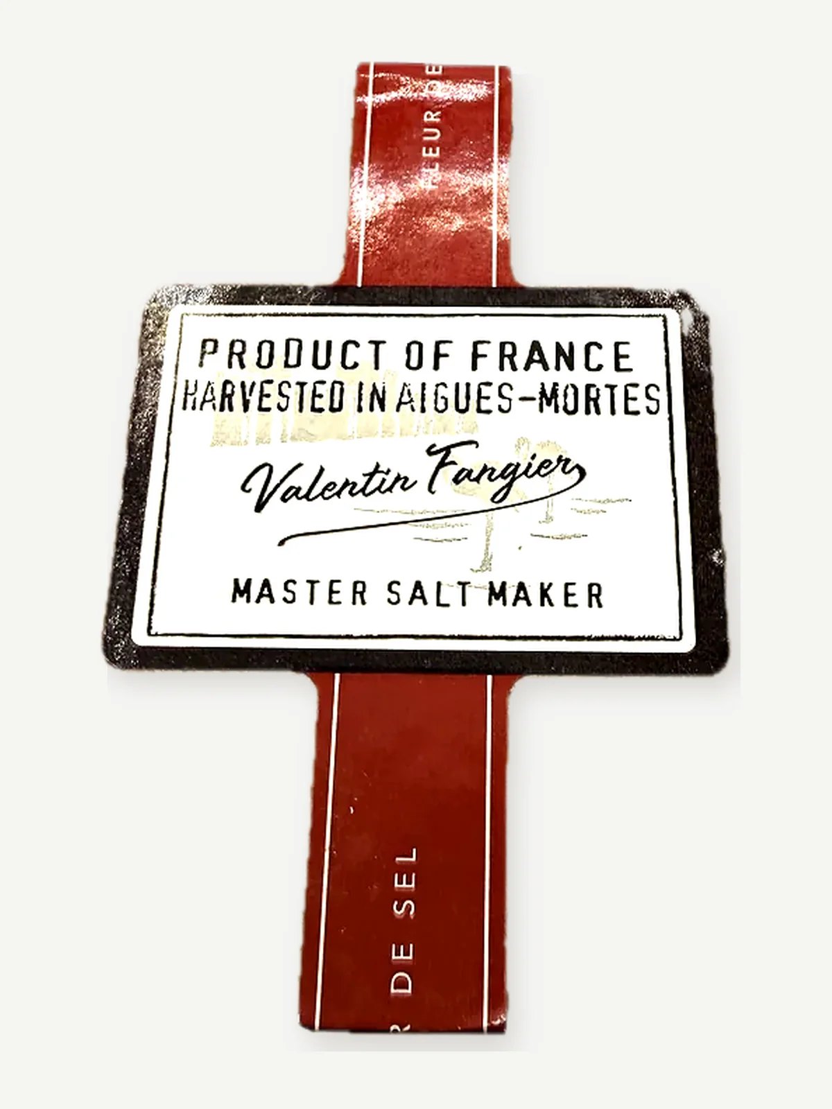 Lid label of a Le Saunier de Camargue fleur de sel drum reading Product of France, harvested in Aigues-Mortes, Valentin Fangier, Master Salt Maker