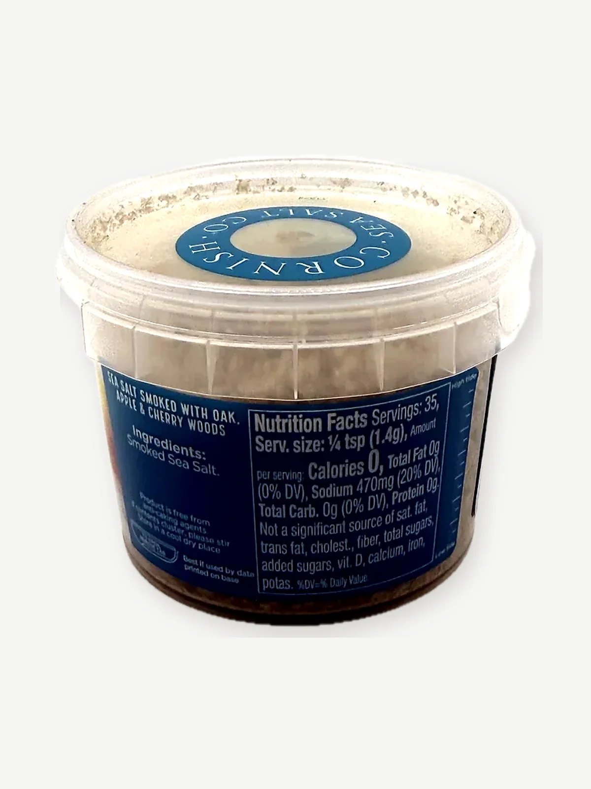 Side of the Cornish Sea Salt Co. Smoky Flakes tub showing the ingredient line Smoked Sea Salt and the Nutrition Facts panel