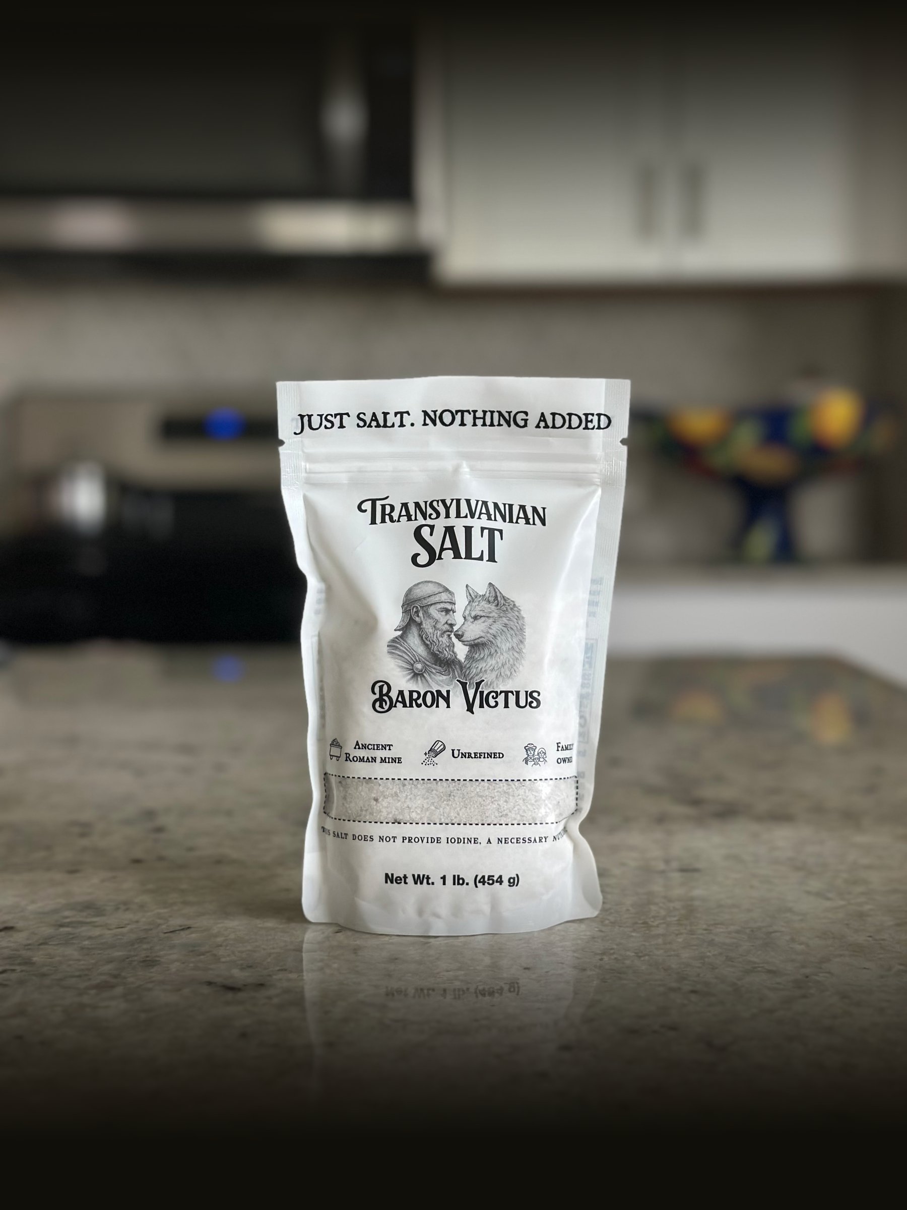 A Baron Victus Transylvanian Salt pouch on a kitchen counter.